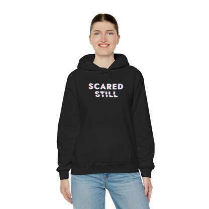 SCARED STILL embroidered hoodie being worn