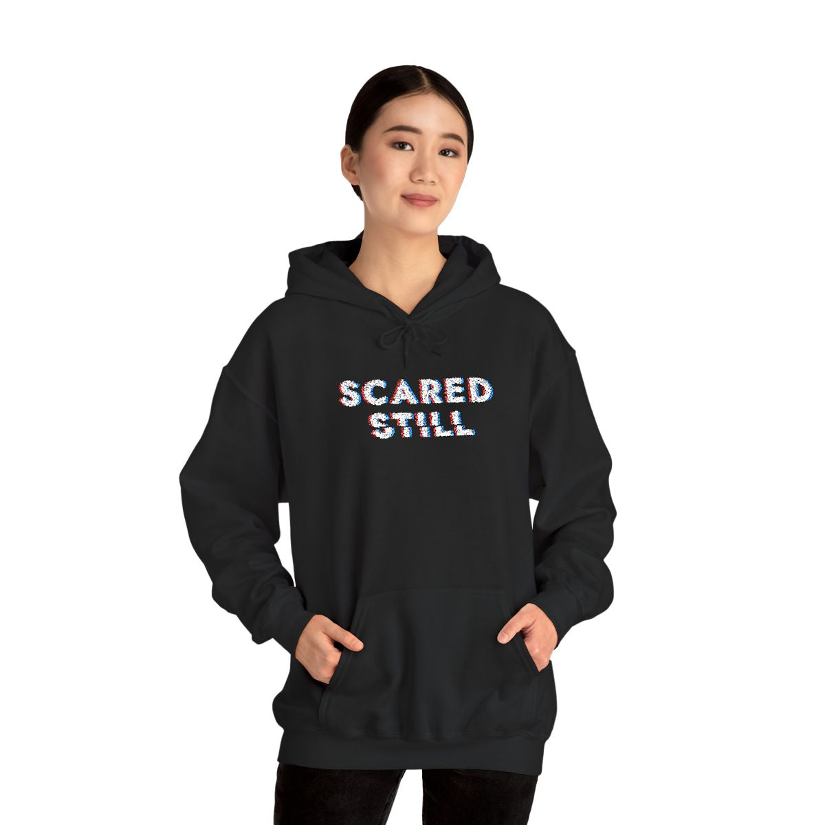 SCARED STILL embroidered hoodie being worn